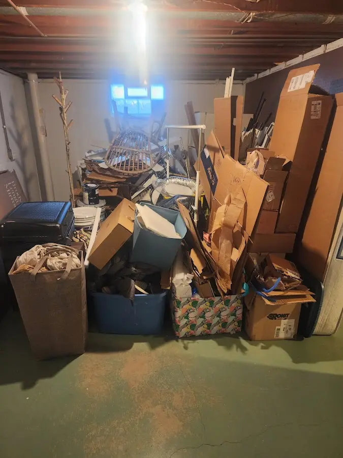 Roll-off dumpster container at job site for Construction Dumpster Rental in Hastings